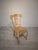 Rustic-style chair made of solid pine wood. The seat is woven from natural fabric. A simple, traditional design with...