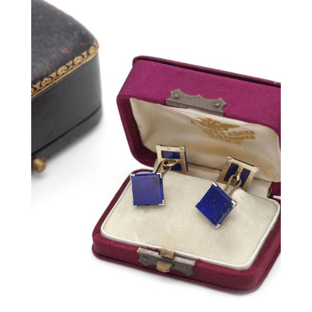 Lapis lazuli cufflinks in 18 karat white gold. Pair of cufflinks adorned with square-shaped lapis lazuli plaques, an...