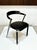 A sculptural and well-proportioned chair made of steel, black lacquered beech, and black leather. Typical of the late...