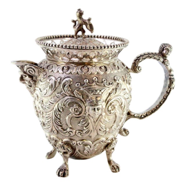 Embossed Silver Milk Jug with Female and Elf Faces, Lid with Lion-Shaped Handle and Claw-Shaped Feet For Sale