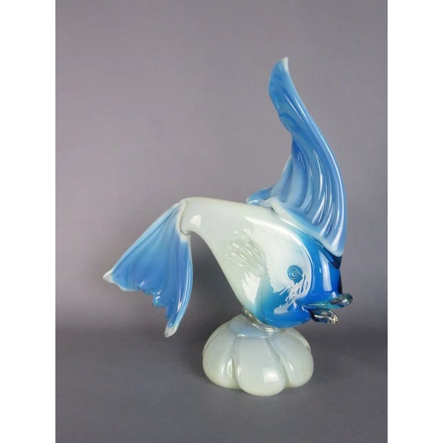 Stunning decorative sculpture in Vintage Murano glass, blue and white, depicting a beautiful blue and white fish....