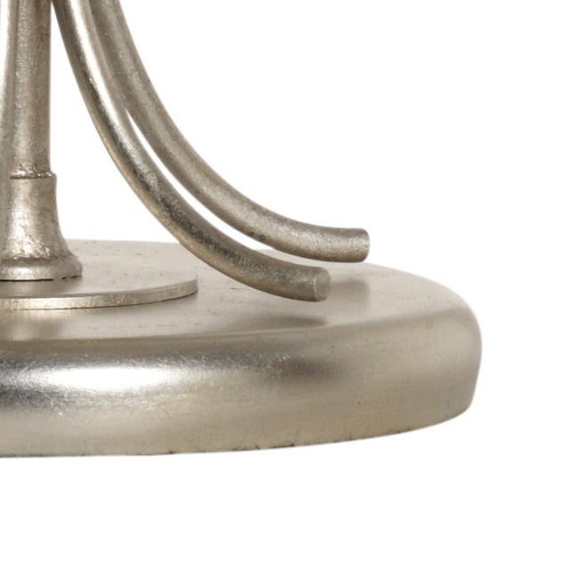 Hand Finished Silver Leaf Lamp With Gracefully Curved Body And Detailed Palm Leaves. Clean with a dry cloth