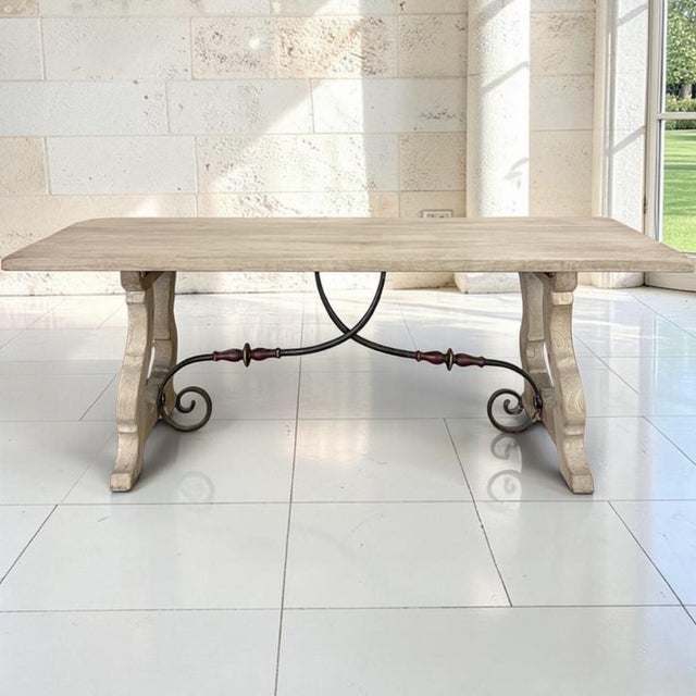 Crafted in Spain from thick, solid oak timbers, this dining table has the generous proportions and enduring construction...
