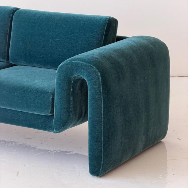 c. 1980s. USA. Made in Chicago Attributed to Interior Crafts. Reupholstered in blue mohair. This piece is attributed to...