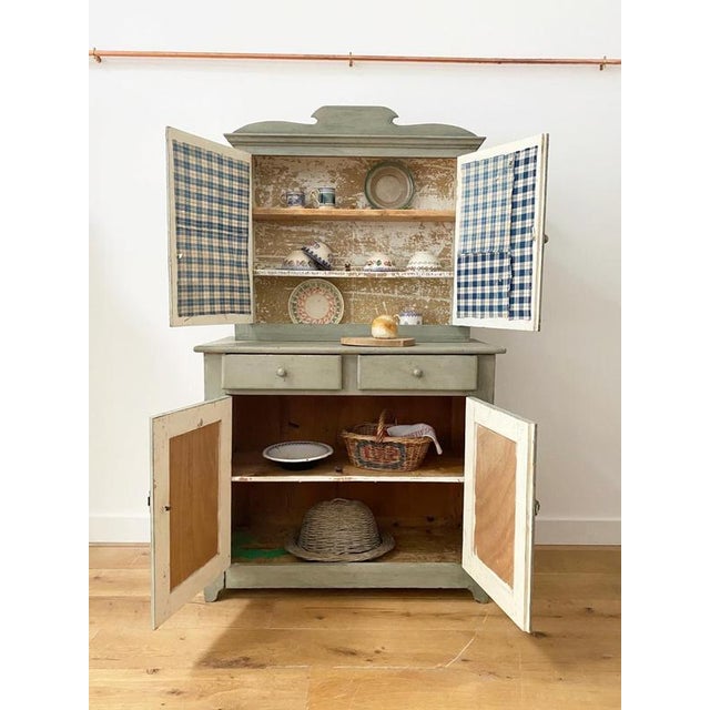 A fabulous French farmhouse dresser with such character. Gingham lined doors and original paint, it’s brimming with...