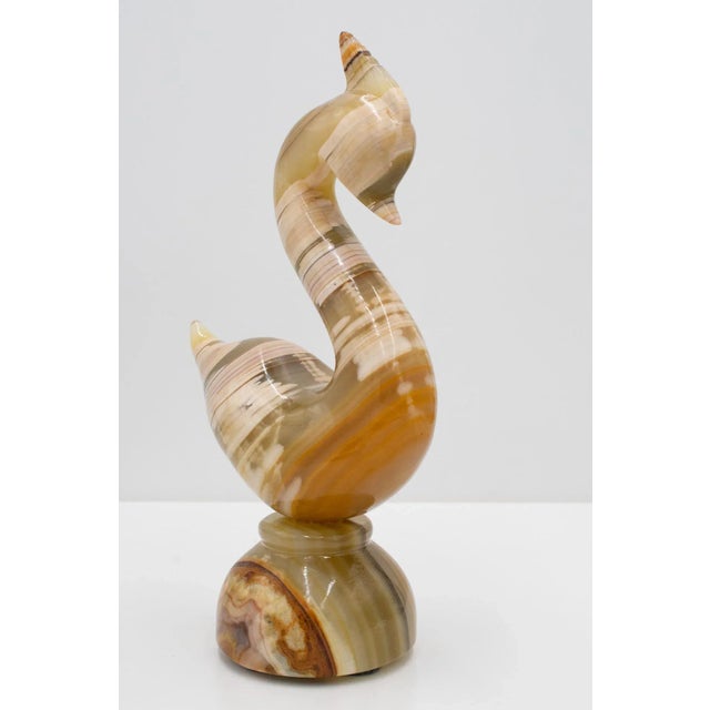 Onyx sculpture of a crested swan or ducf; from a collectors estate in Minneapolis. 12.75 inches tall, 7-inches wide. Great...