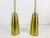 Pair of very rare pendant lamps made in Germany in the 1950s. The lighting is made of brass and has the style of the...