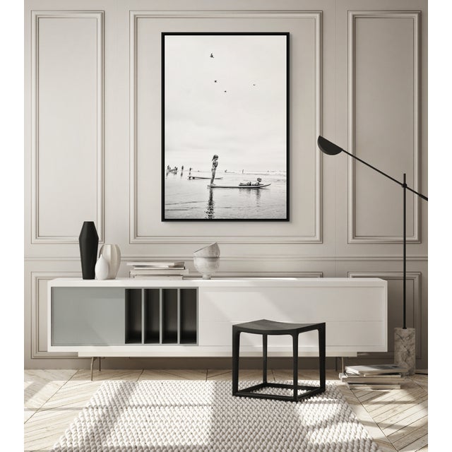 Summer Serenity distills the stillness of childhood by the ocean into a single, weightless moment. Two children balance on...