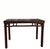 This mid 19th century antique console table features a minimalist, architectural open-frame design with a rich, dark...