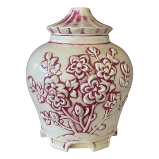 Vintage Chinoiserie Handmade Ceramic Pagoda Lidded Jar With Raised Floral Motif For Sale