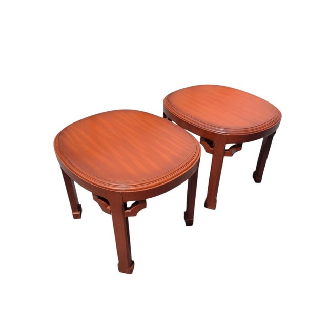 ​Elevate your living space with this striking pair of vintage Chinoiserie Asian Modern side tables by Jasper. The side...