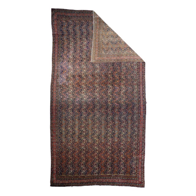 A rare format for this SW Persian nomadic tribe, this all- wool Kellegi (long carpet) show a vertical stripe (or "cane")...