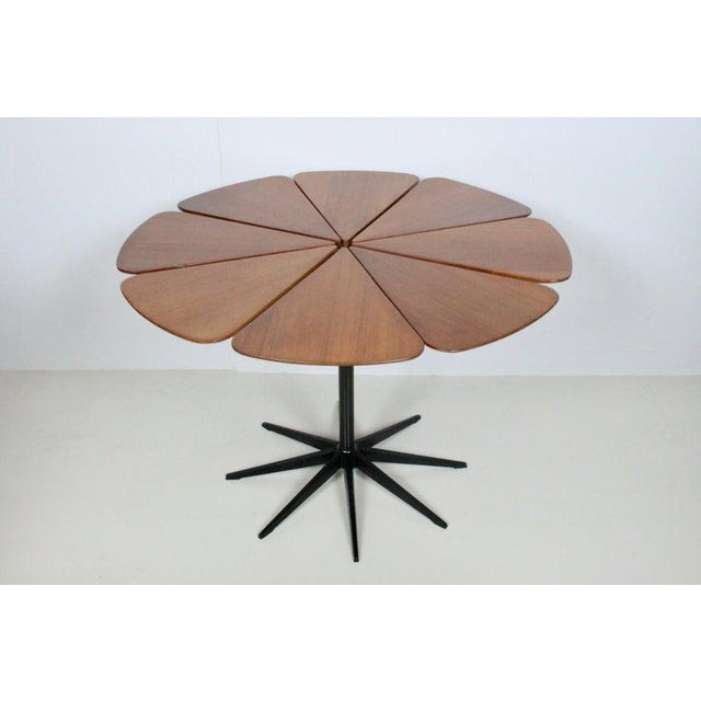 Richard Schultz for Knoll "Petal" Red Cedar and Iron Dining Table, C. 1960s. Featuring a recreated flower-like top by...