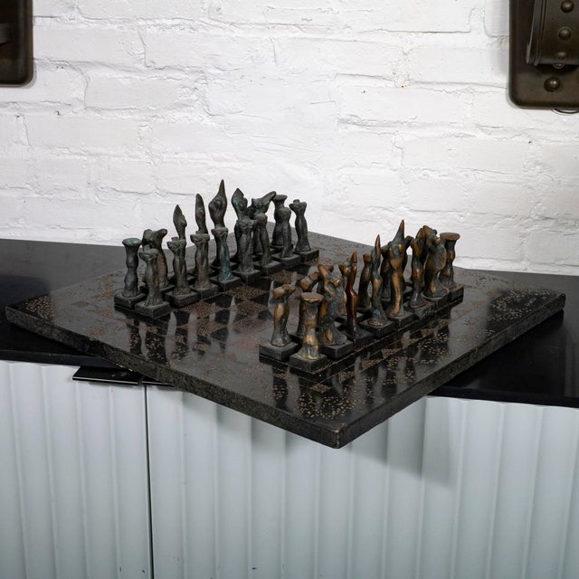 Brutalist style bronze and marble chess set