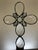 This one-of-a-kind assemblage sculpture pairs an embossed clear glass flask bottle with a handcrafted cross composed of...