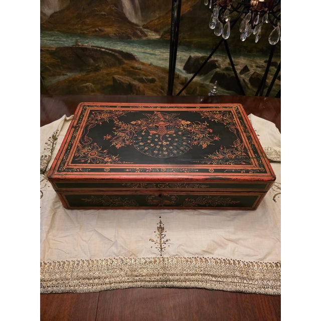 A rare antique large chinese red lacquered box . Having exquisite handpainted enamel decoration depicting glorious...
