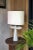 L05 crater lamp by sophie vaidie one of a kind. Dimensions: d 28 x w 40 x h 64 cm. Materials: beige stoneware with crater...