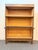 Family heirloom. Three separable bookcase sections plus top and bottom pieces. Bottom bookcase is slightly taller than the...