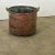 Dimensions: 16 ½” H x 20 ¼” W x 19” D A substantial antique English copper pot, with two narrow handles at the rim, from...