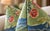 A whimsical pair of custom pillows featuring GP & J Baker x Kit Kemp Knight’s Tale Texture in Spring Green. Inspired by an...