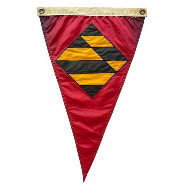 A classic vintage yacht club burgee from Annapolis Yacht Club, featuring a bold red field with a striking black and gold...