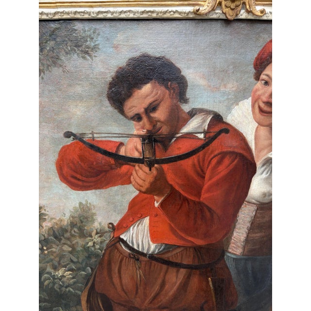 Flemish School of Haarlem, 17th century A young man aiming a bow and a young woman carrying a basket of game, Oil on...