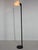Italian vintage floor lamp with black metal base and Murano glass shade. The lamp has been newly sprayed. It has an...