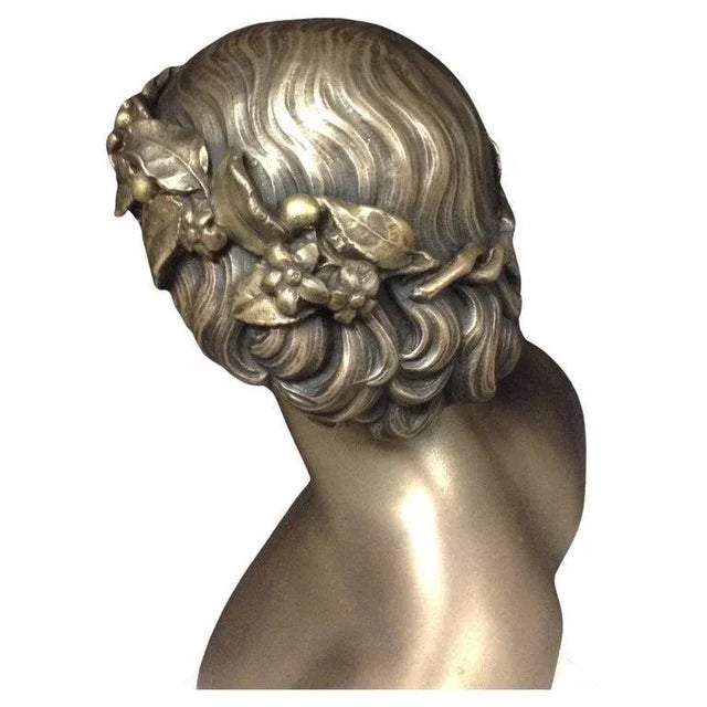 This exquisite 20th-century bronze sculpture of Antinous, the beloved companion of Emperor Hadrian, captures the timeless...