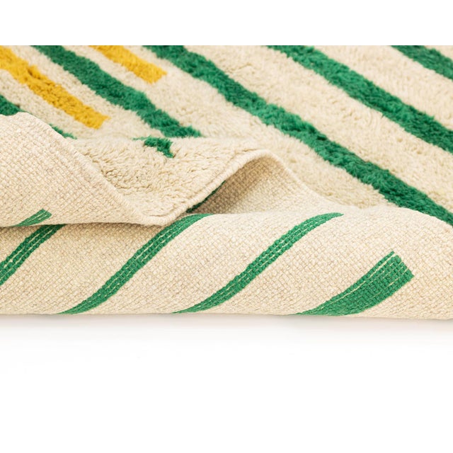 Vibrant Hand-knotted wool rug featuring a Taupe base with alternating stripes in Forest Green and Goldenrod, creating a...