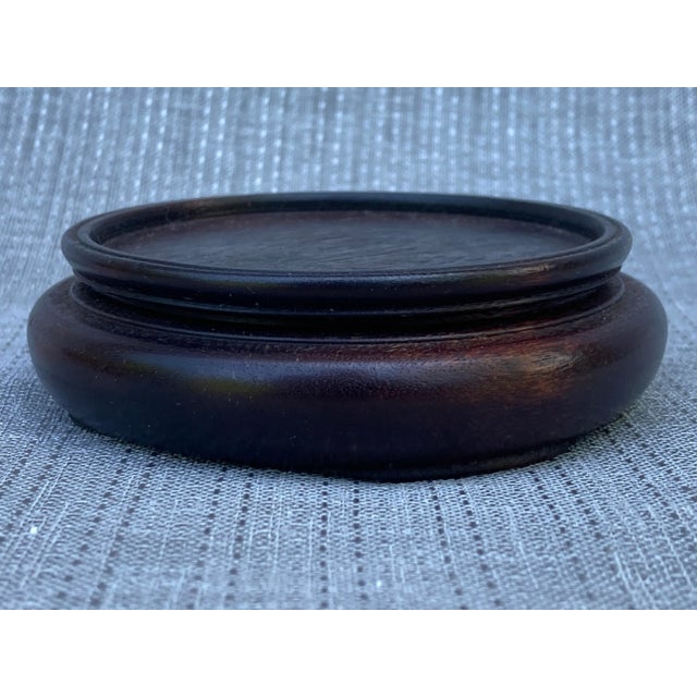 Small vintage dark stained wood vase or jar stand. Simple, minimal design. Great condition. No makers mark. Stand measures...