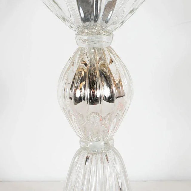 This elegant pair of uplights were handblown in Murano, Italy- the island off the coast of Venice renowned for centuries...