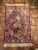Silk prayer mat. Deep rich magenta tones with creams and blues. Hand knotted and adorned with fringe. perfect wall...