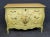 John Widdicomb Italian Style Paint Decorated Commode , blond maple top, paint decorated Bombay form base with flower and...