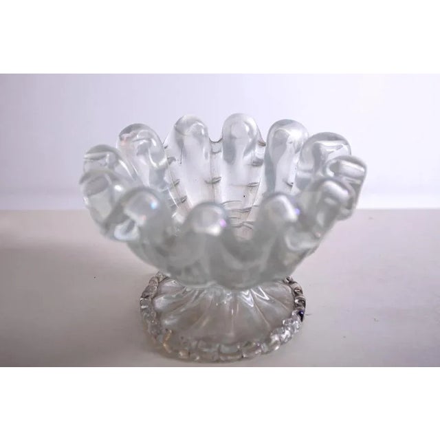 Elegant vase by Ercole Barovier of the 1930s. The vase is made with iridescent technique, in fact the whole object is made...