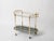 Stunning Italian mid-century bar cart entirely made of tubular gilt metal, completed with a deep green mirrored lower...