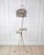 A charming 20th century French birdcage-form plant stand featuring beautifully weathered original paint and delicate...