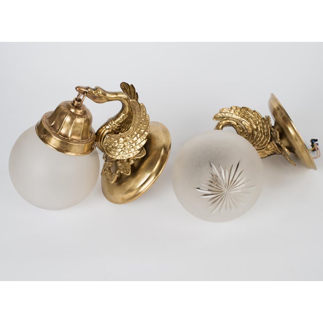Spanish Revival 1950s Spanish Empire Chased Brass Swan Wall Sconces With Starburst Frosted Globes - A Pair For Sale - Image 3 of 13