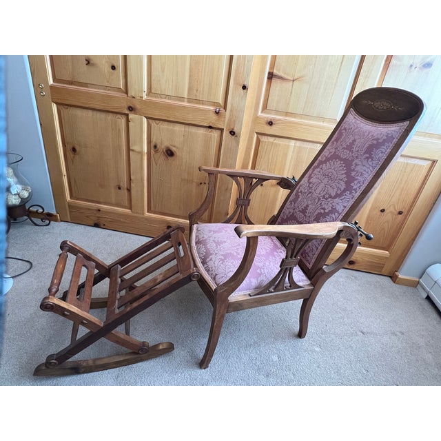Very early Murphy reclining chair. A long metal rod fits into four hook placements on back of chair to set four different...