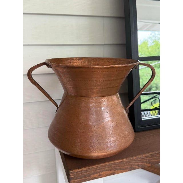 This large ‘Conca Abruzzese’, a traditional Italian copper vessel which was used throughout central Italy to fetch water,...