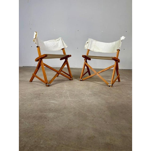 Pair of Praia Folding Chairs – Pier Giacomo Castiglioni, Gavina, 1960s An elegant pair of Praia folding chairs designed by...