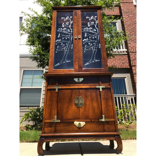 Jaw Dropping Vintage pagoda topper china cabinet. This cabinet is stained in a walnut finish and with beautiful Campaign...