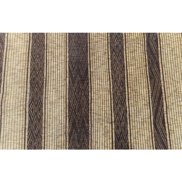 This exceptional vintage Moroccan Tuareg rug from the 1950s showcases the refined, minimalist aesthetic characteristic of...