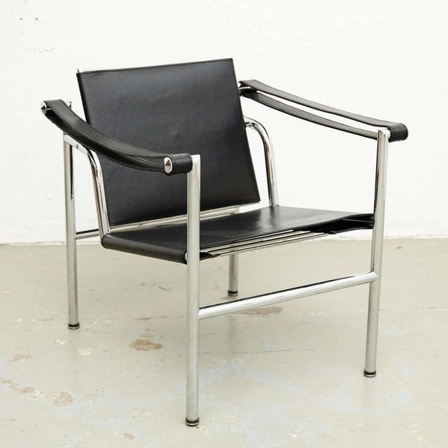 Le Corbusier, Pierre Jeanneret and Charlotte Perriand LC1 black leather lounge chair. chromed steel. By unknown...