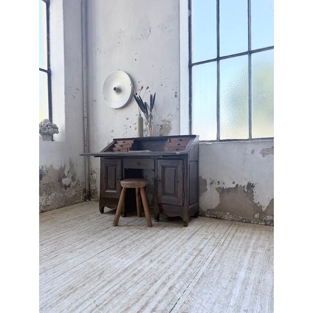 Very old 19th-century solid oak secretary desk. with its rustic, raw appearance, it comes from the auvergne region of...