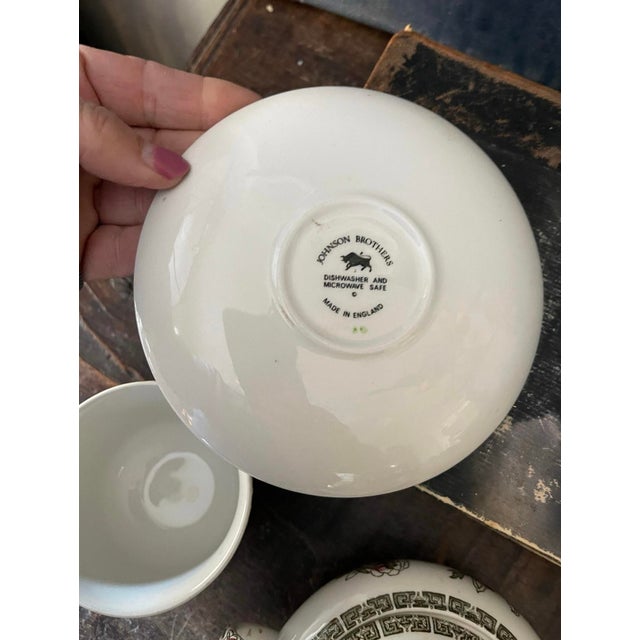 Timeless and classic English, China, by Johnson Brothers, presented in the Indian tree pattern. Crisp white China with a...