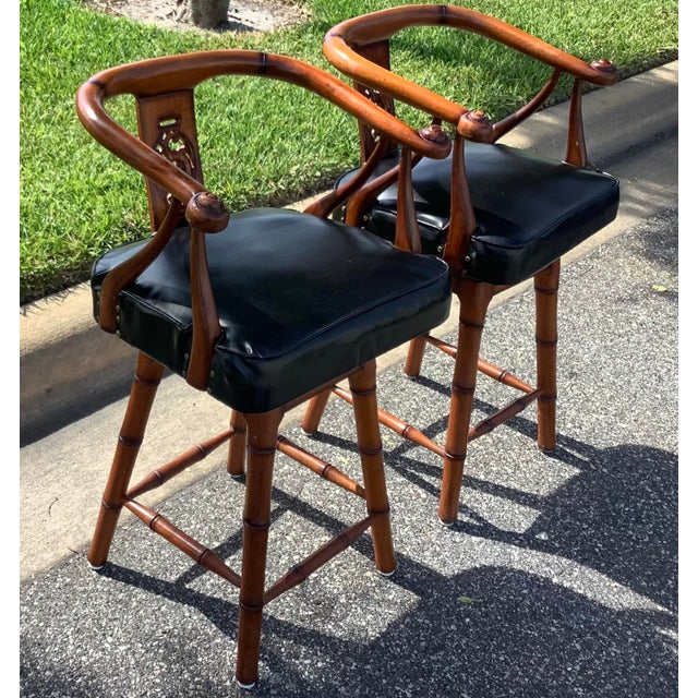 These fantastic chairs were made in the US around the 1970s. Featuring hardwood frames ornately carved into the shapes you...