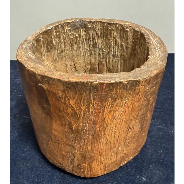 Hewn from one piece of chestnut. Made in Spain circa 1850. An interesting and very rare wooden mortar primitively carved...