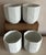 Set of four (4) glazed white pottery octagonal planters made in France by Limoges. New old stock, never used. Features an...