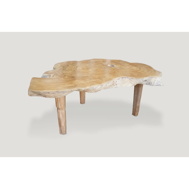 Reclaimed teak coffee table or side table with a natural oil finish. Floating on midcentury style legs. We can lower the...