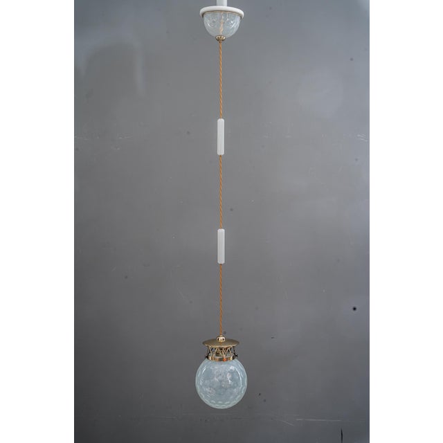 Koloman Moser Attributed to Bakalowits & Söhne Pendants with loetz glass shade around 1908 The glass shades were obtained...